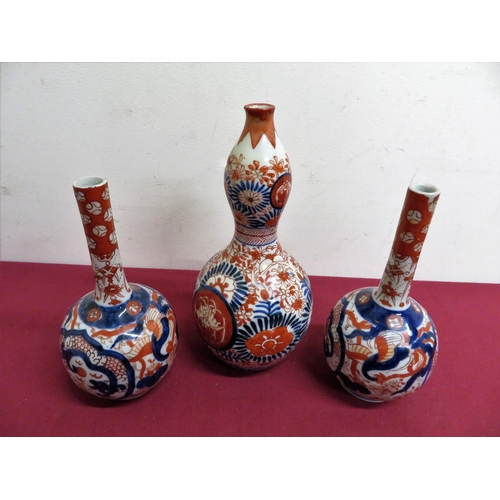 12 - A pair of Japanese Imari pattern mallet shaped vases (H18cm), similar double gourd shaped vase. (H22... 
