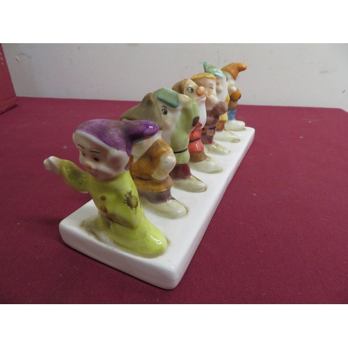 194 - Wade Tetley Tea small teapot, sugar bowl, and tea caddy, three Tetley Tea mugs and two eggcups, Wedg... 