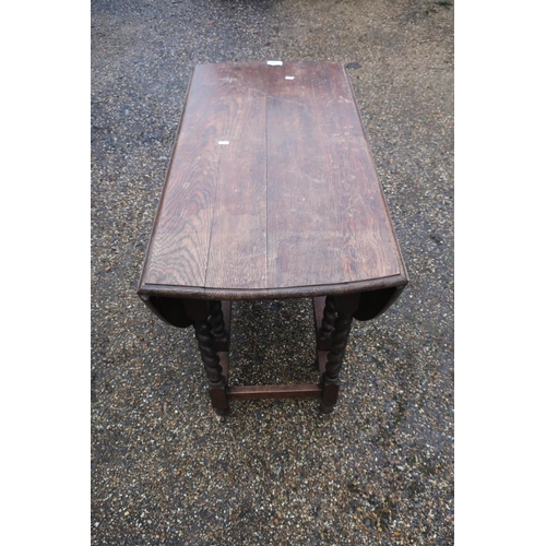286 - 20th C oak drop-leaf gate-leg dining table on barley twist legs, and a set of four similar rail back... 
