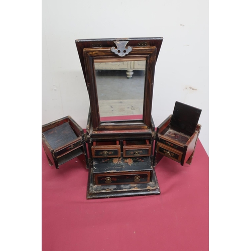 76 - Japanese lacquered travelling dressing table box with hinged top, mirrored section and two fold out ... 