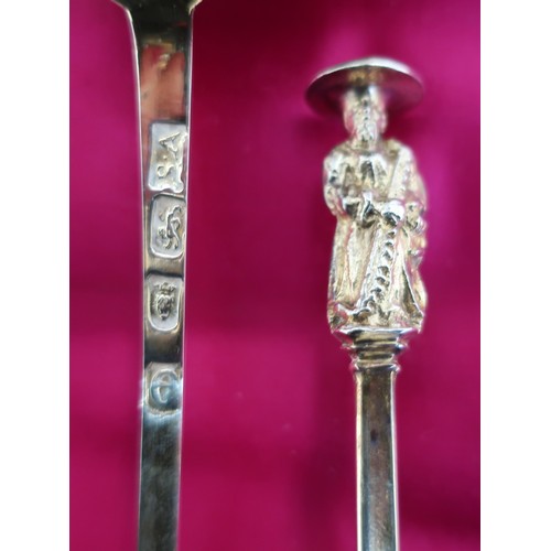 24 - Pair of Geo. lll hallmarked silver gilt Seal top spoons, the figural cast terminal with eagle seal o... 