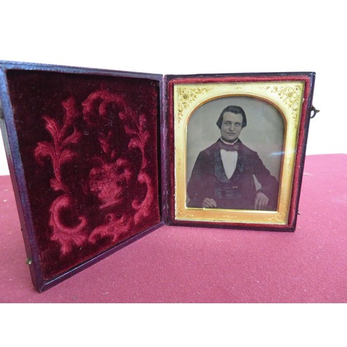 23 - Victorian Ambrotype photo. study of a gentleman, in arched mount, and leather case