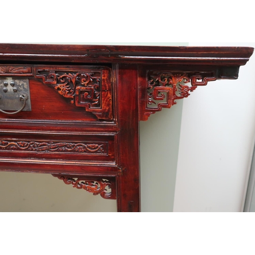 194 - Chinese altar table, overhanging top with two drawers with carved detail above similar frieze on squ... 