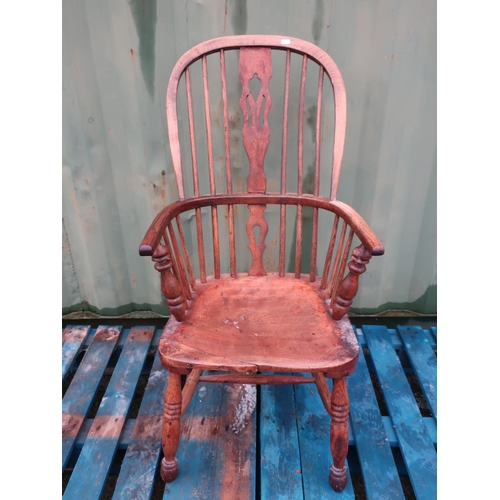 192 - 19th C ash and elm stickback Windsor armchair, on H shaped understretcher and turned supports