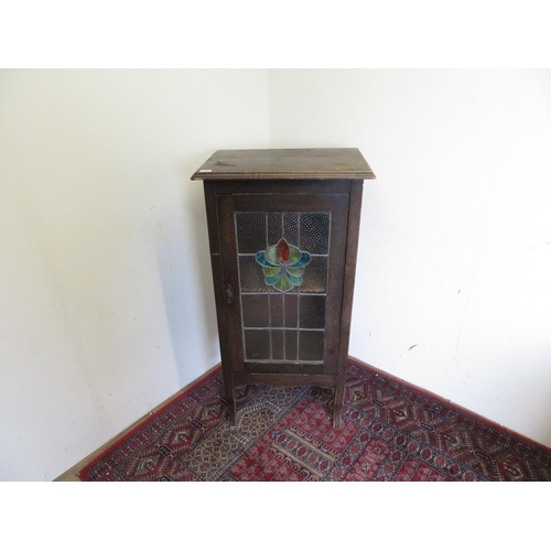 176 - Early 20th C Art Nouveau style oak cabinet enclosed by single lead glazed door with coloured glass s... 