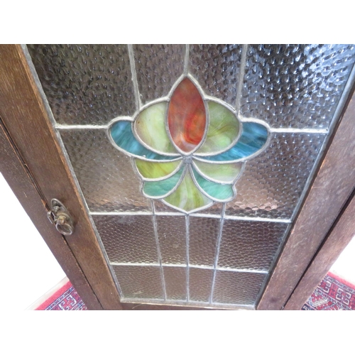 176 - Early 20th C Art Nouveau style oak cabinet enclosed by single lead glazed door with coloured glass s... 