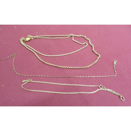 33 - Two 9ct gold necklaces stamped 375, a necklace stamped 14K and a paperchain link necklace stamped 9K... 