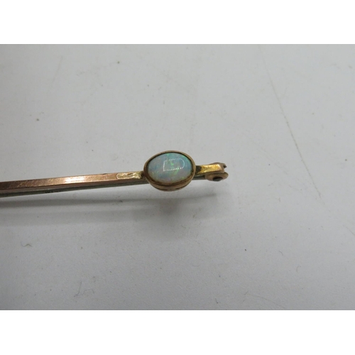 234 - Gold bar brooch set with a single turquoise stamped 9ct, and a white metal brooch in the form of a m... 