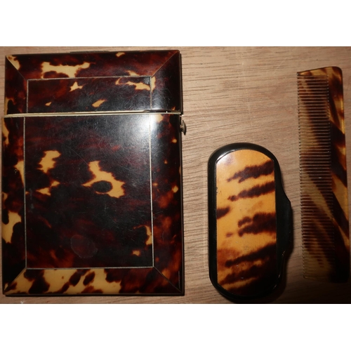 313 - A Victoria tortoiseshell card case with hinged lid and white metal inlay (lid A/F), and a tortoisesh... 