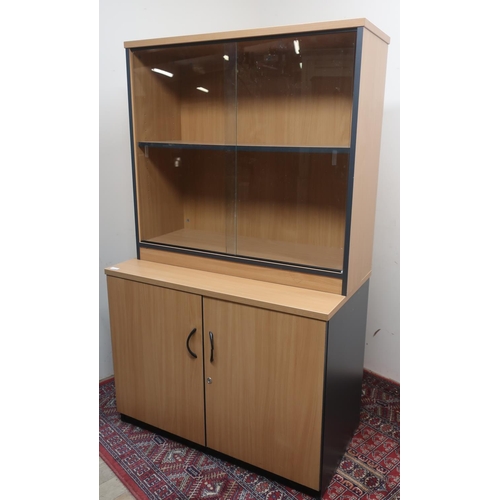 338 - Modern beech finish office bookcase enclosed by two glazed doors (W95cm x H89cm x D36cm), and a simi... 
