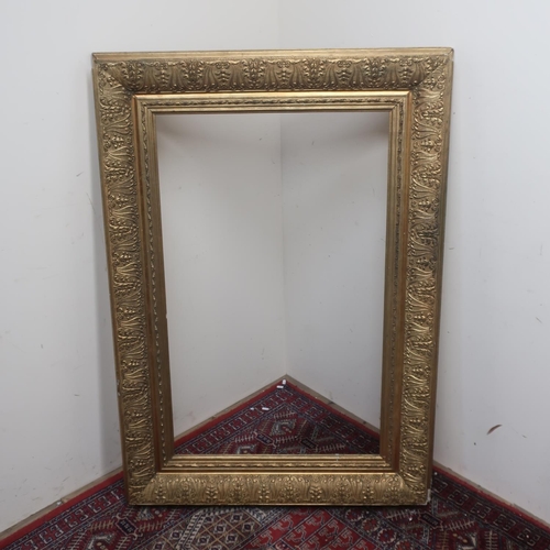 367 - Large early 20th C gilt wood and gesso rectangular picture frame, aperture 62.5cm x 101cm
