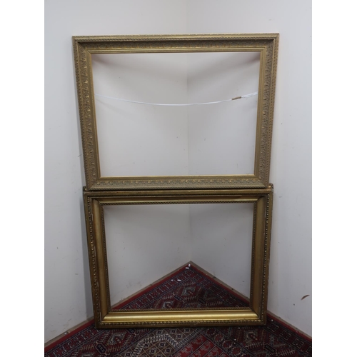 368 - 20th C gilt wood and gesso rectangular picture frame, aperture 63.5 x 81cm, and a modern gilt pictur... 