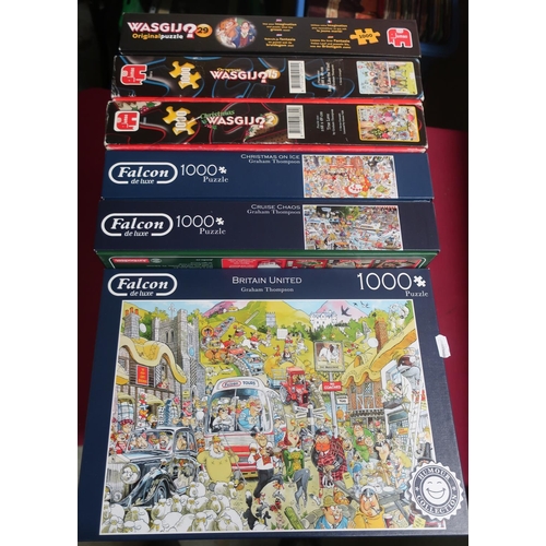 387 - Three Falcon delux 1000 pc jigsaw puzzles and three Wasgij 1000 pc jigsaw puzzles, not checked for c... 