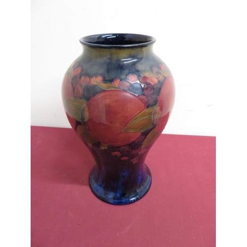489 - Large Moorcroft vase, baluster body decorated in Pomegranate pattern, signed to base, H33cm