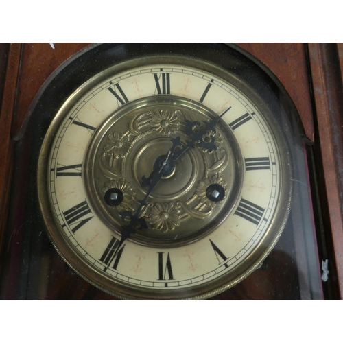 414 - Early 20th C Vienna style wall clock, with cream Roman dial, twin train movement striking the half h... 