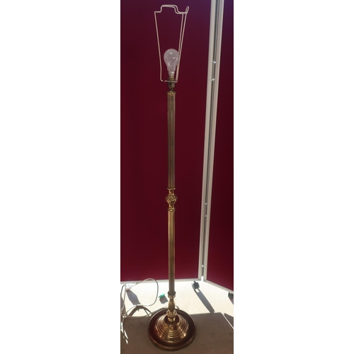 441 - Brass standard lamp, with reeded column on stepped circular base