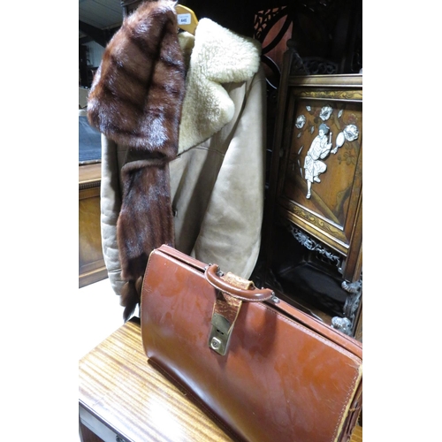 446 - Nurseys Gents sheepskin coat, a mink stole and a gents brown leather briefcase (3)