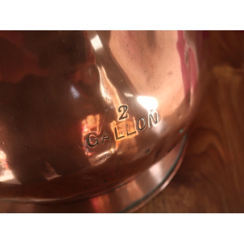 457 - Victorian copper two gallon measure, with brass plaque for L Lumley & Co America Square London, stam... 