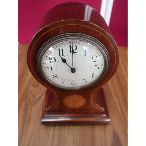 461 - Edwardian inlaid mahogany balloon shaped mantel time piece with white Arabic dial on four brass ball... 