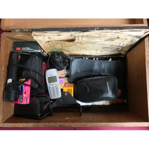 372 - Stained rectangular box containing set of artists oil paints, vintage Nokia mobile phone, cameras an... 