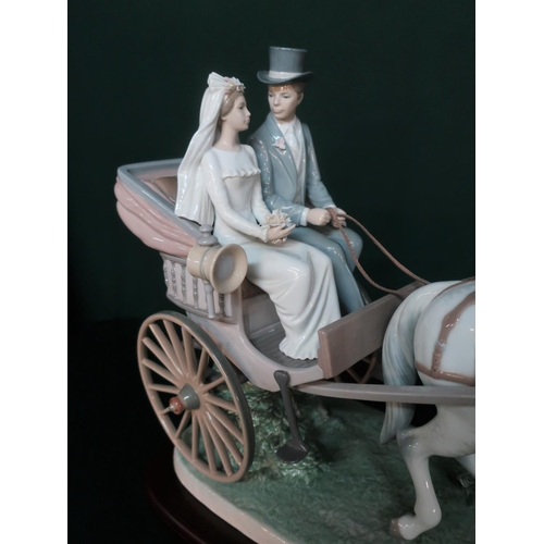 13 - Lladro figurine 1802 “Love And Marriage” in original box. H36cm, including base.