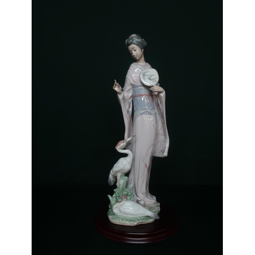 20 - Lladro figurine 6572 “In Touch With Nature” in original box. H42cm, including base.