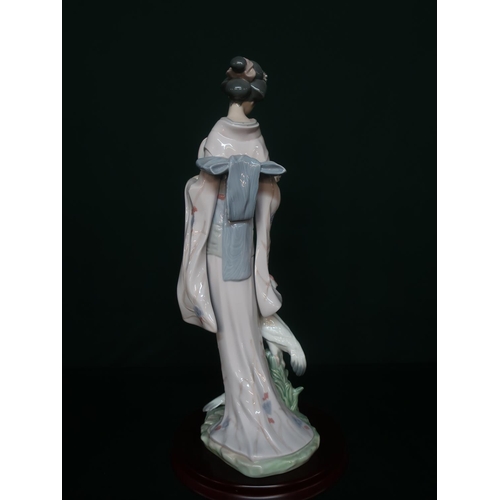 20 - Lladro figurine 6572 “In Touch With Nature” in original box. H42cm, including base.