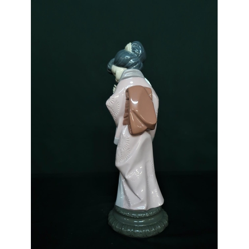 46 - Lladro figurine 4990 “Timid Japanese” in original box, H29cm.