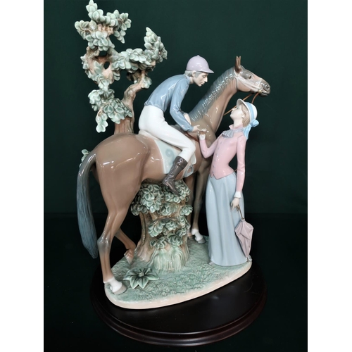 76 - Lladro figurine 5036 “Jockey With Lass” H40cm, including base.