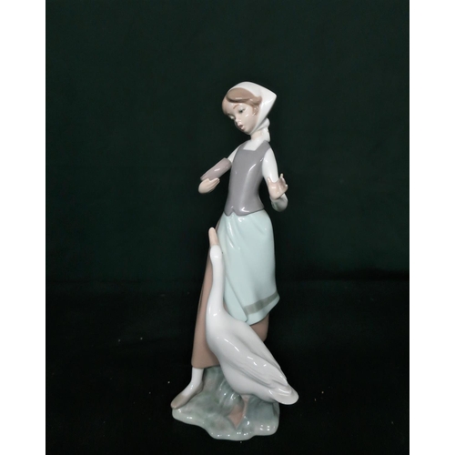 80 - Lladro figurine 1278 “Jealousy” H23cm and Lladro figurine 1052 Girl Feeding Goose and Lladro figurin... 