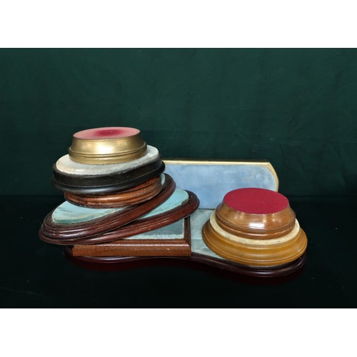 138 - Nine Velvet figurine bases, max L38cm min L11cm.