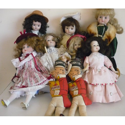 208 - Two Force Wheat Flakes Sunny Jim fabric figures and a collection of eight various bisque head dolls ... 