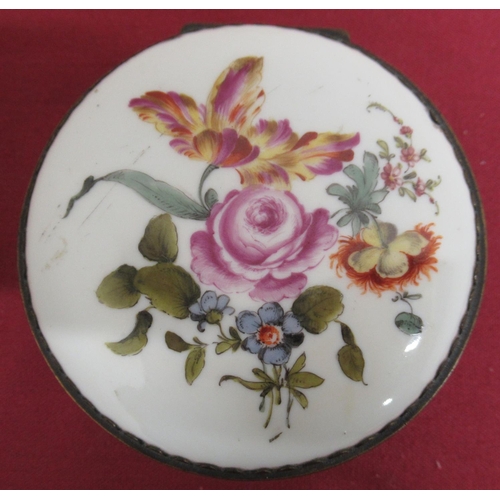 10 - 19th C continental gilt metal mounted porcelain circular box hand painted with flowers, with label 