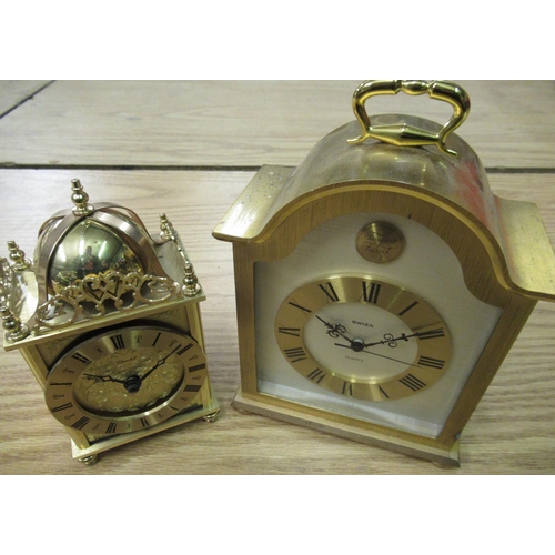 110 - Swiza quartz carriage clock in lacquered brass case and a quartz lantern clock (2)