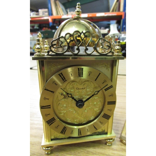 110 - Swiza quartz carriage clock in lacquered brass case and a quartz lantern clock (2)