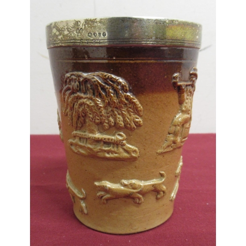 2 - Doulton Lambeth type glazed stoneware beaker with relief moulded country scenes and hallmarked silve... 