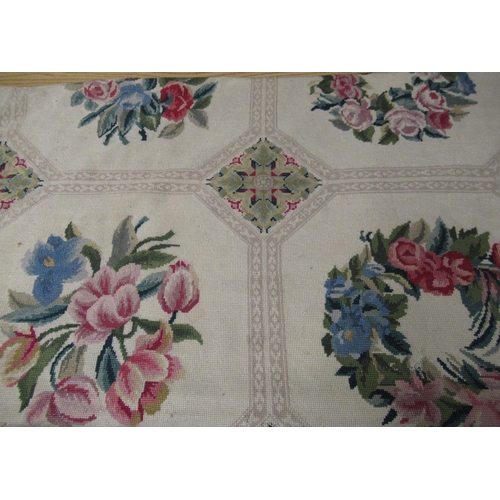 47 - 20th C woolwork rug, beige ground with geometric and floral pattern centre, grey border 300cm x 236c... 