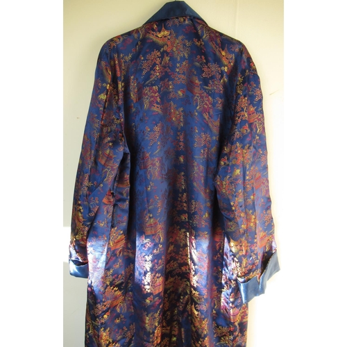 68 - 20th C Chinese silk type dressing gown, blue ground with chinoiserie decoration and blue lining bear... 