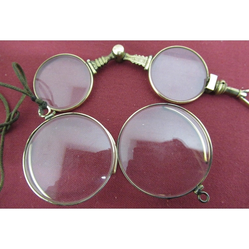 7 - Victorian rolled gold lorgnette and two rolled gold monocles (3)