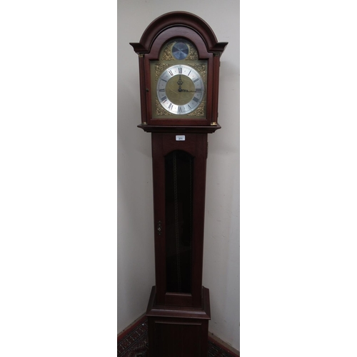 271 - Georgian style mahogany long cased clock, with arched brass dial, three train movement chiming on ro... 