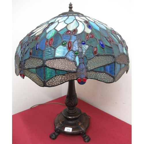 274 - Verdigris metal table lamp, with acanthus cast column on four paw feet with Tiffany dragonfly style ... 