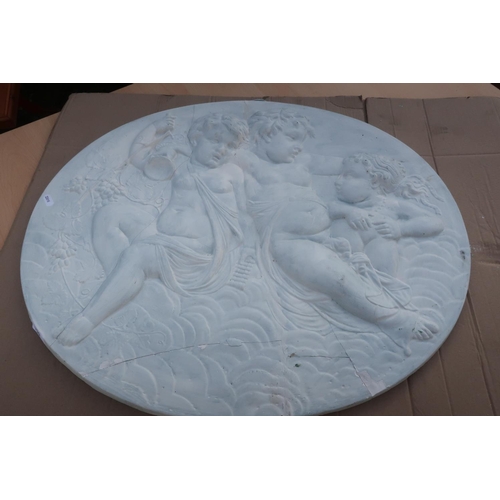 425 - Oval plaster plaque of merry cherubs (70cm x 59cm) (A/F)