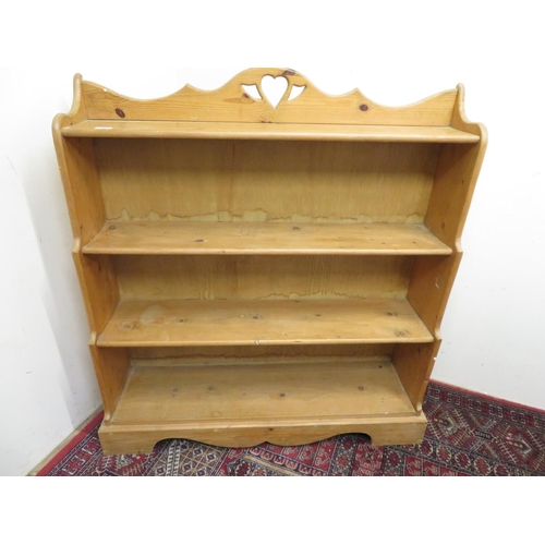 397 - Waxed pine graduated four tier open bookcase, W105cm D29cm H114cm