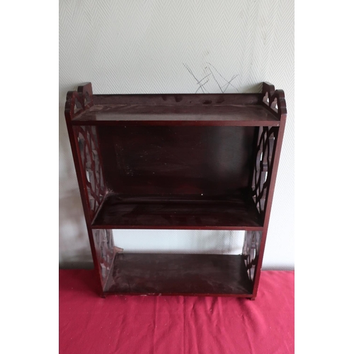 403 - Edwardian mahogany three tier wall shelf with fretwork sides, W41.5cm D15cm H55cm