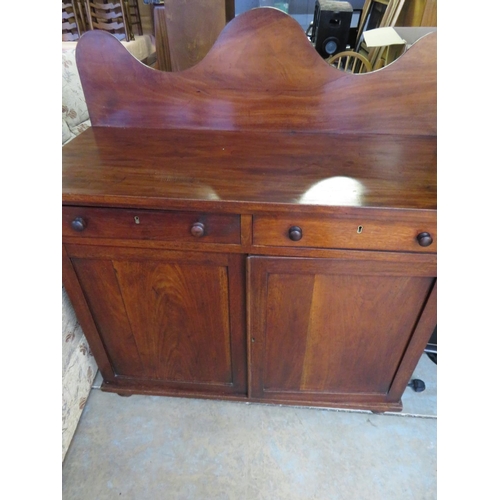 407 - Victorian mahogany sideboard with raised shaped back above two drawers and two panelled doors W111cm... 