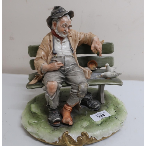 449 - Naples Capodimonte style model of a tramp feeding pigeons on a bench, by B. Merli