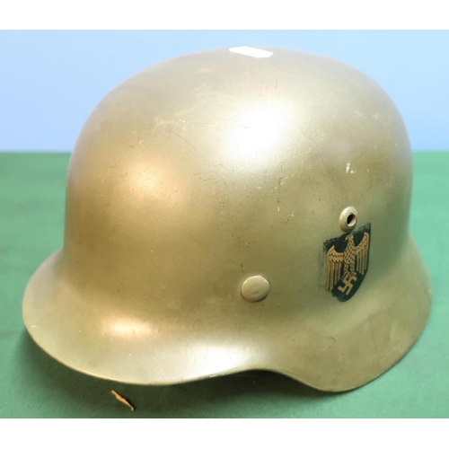 10 - German M35 steel helmet complete with leather liner mark 59 stamped ET66 the leather chin strap with... 