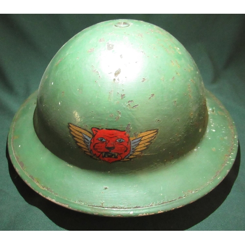 9 - c.WWII British steel helmet with liner, webbing and chinstrap, with painted decal