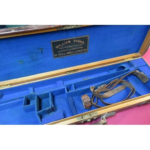 223 - Vintage leather and brass bound oak lined gun case, with blue baise fitted interior and trade label ... 