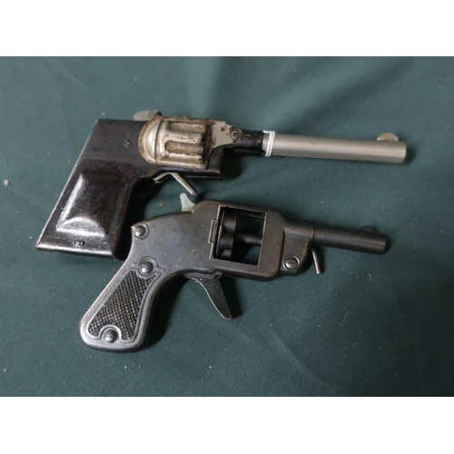61 - Two Vintage tin toy cap guns (2)